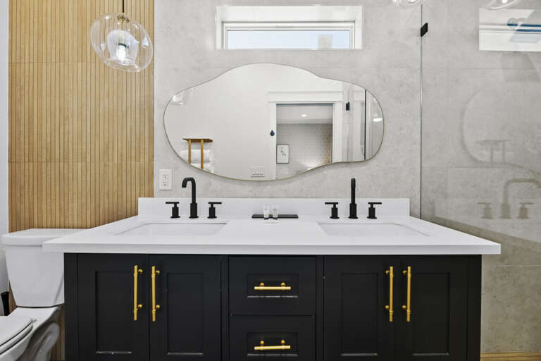 Bathroom 2 with double vanity sinks and modern mirror!