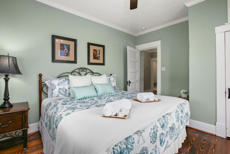 One of 3 bedrooms upstairs. Queen bed and TV with streaming service.