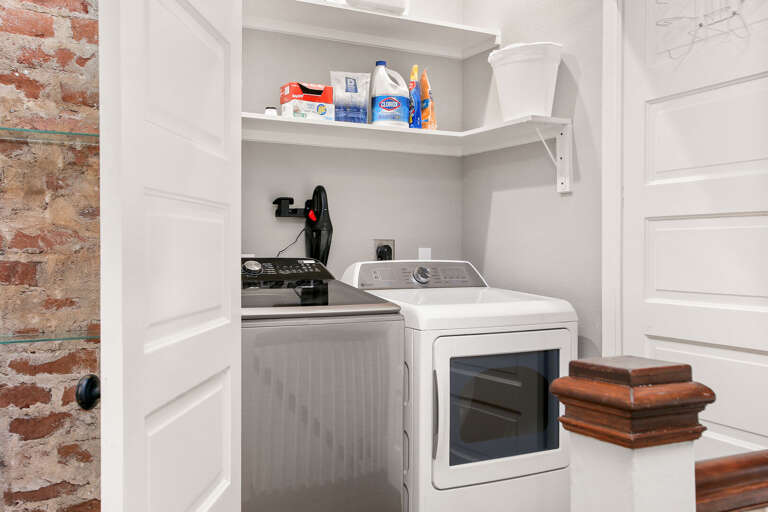 Full size washer and dryer, with  laundry supplies included for your convenience, (located at top of stairs).