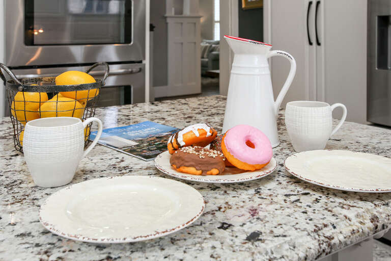 Great bar area in kitchen with high end appliances.   Bring your favorite foods and drinks. Dishes provided.