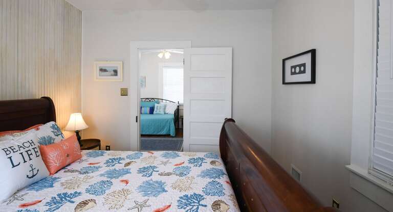 Primary bedroom looking out to daybed/trundle.  Great set up for parents and 2 children.