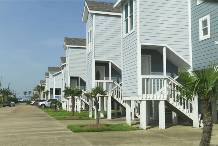 Front entry and parking space in front of townhome. Front entry and parking space in front of townhome.