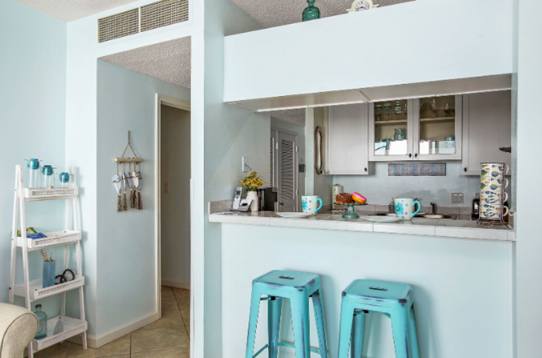 There is enough seating for 2 at the bar and 2 at the kitchen table located by window overlooking the ocean.