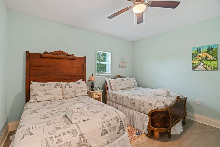 (2) full/queen beds downstairs. A dresser has been added to the bedroom.
