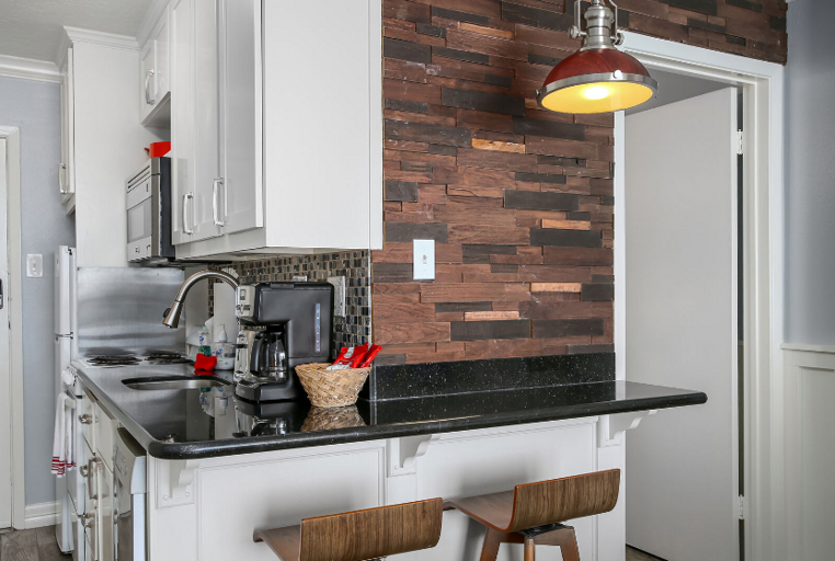 Extra seating with 2 barstools at bar area Extra seating with 2 barstools at bar area