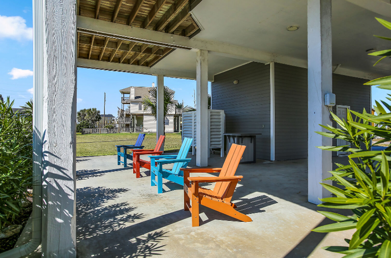 Lots of colorful seating and and outdoor furniture for your enjoyment.