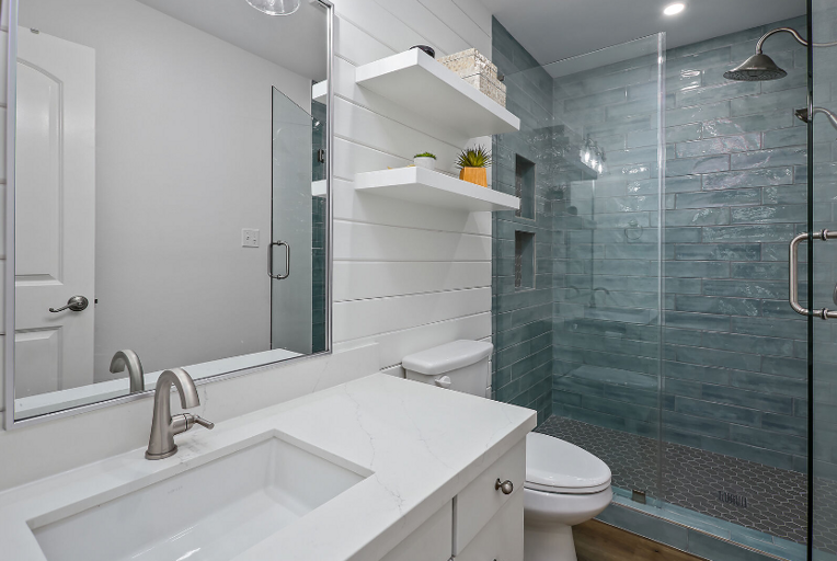 Shared hallway full bath with beautiful tiled shower