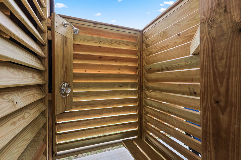 Outdoor shower with hot and cold water.