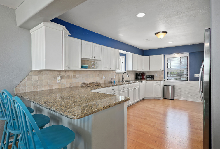 Bar and table seating.  Outdoor table and chairs as well, with water view. Bar and table seating.  Outdoor table and chairs as well, with water view.