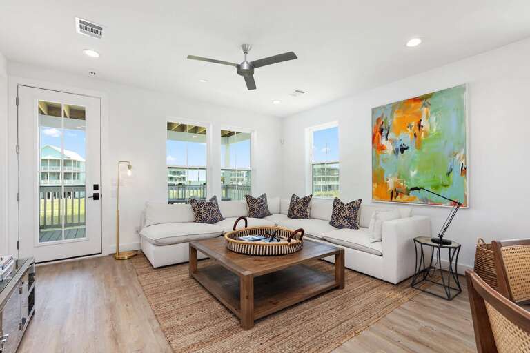 Well appointed, with lovely views of the bay, ocean, and lakes.
This home has such a clean, coastal vibe.