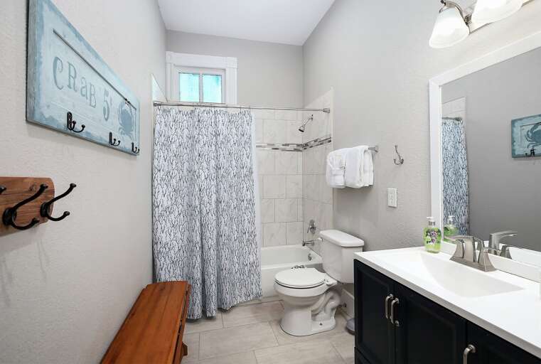 Upstairs Bathroom #2
Large open restroom with combo bathtub and shower. Including his and hers sink.