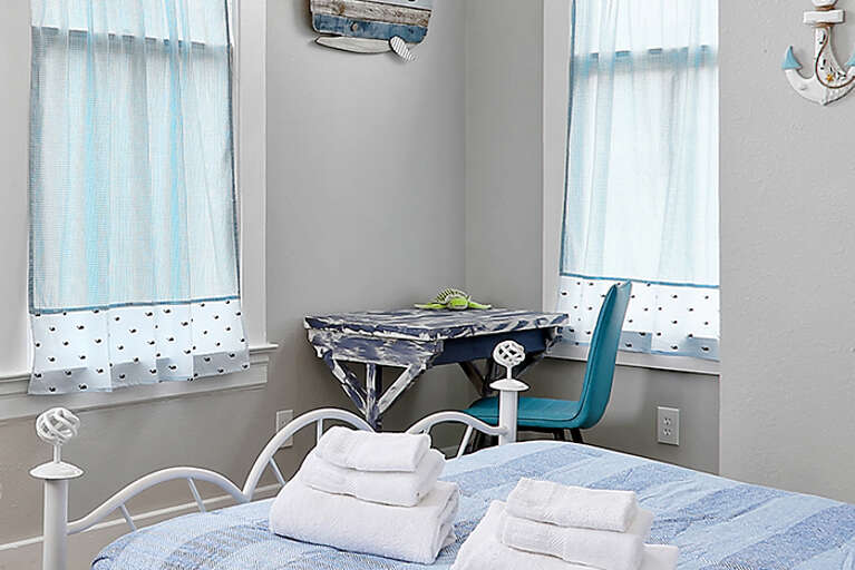 Upstairs Bedroom #4
1 Full
2 Twin
Sleeps 4 in room
Desk area for your convenience.