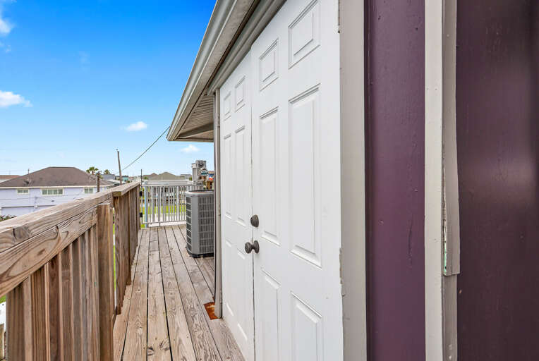 Landry room equipped with washer and dryer for guest use