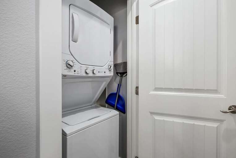 Stacked washer and dryer for your convenience.