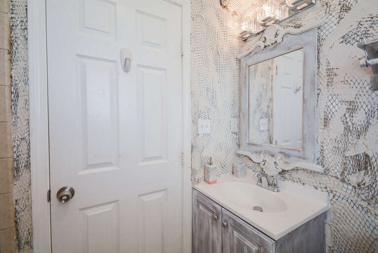 Enjoy the ease and privacy of a 1.5 bath setup, perfect for families and groups.  