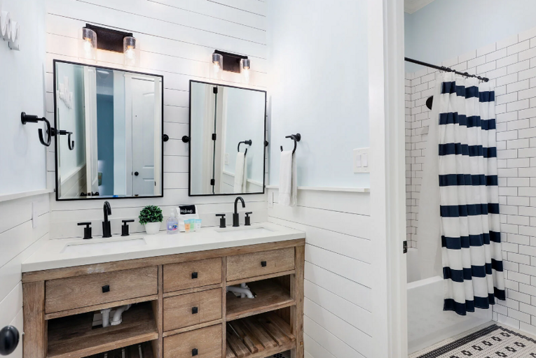 Shower/tub combination, and double sinks. Shower/tub combination, and double sinks.