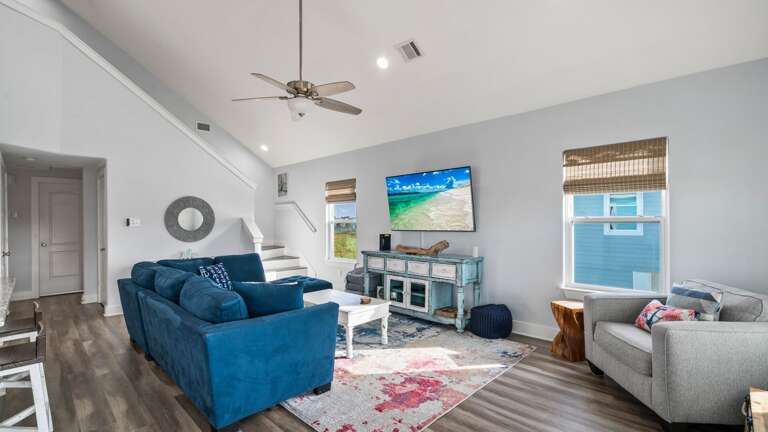 The entire home is bright, blue, and beautiful.