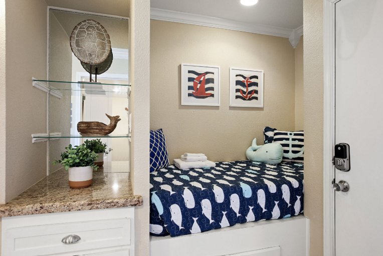 Twin bed in the cute sleeping nook, across from master bedroom in hallway,