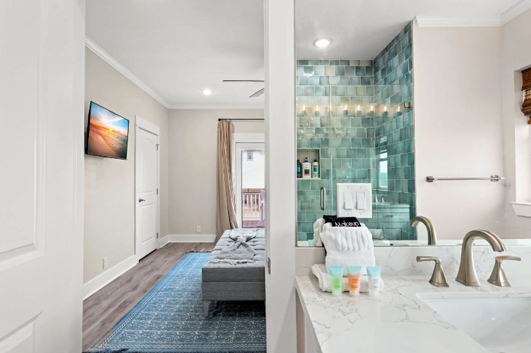 Master bath looking through to the bedroom