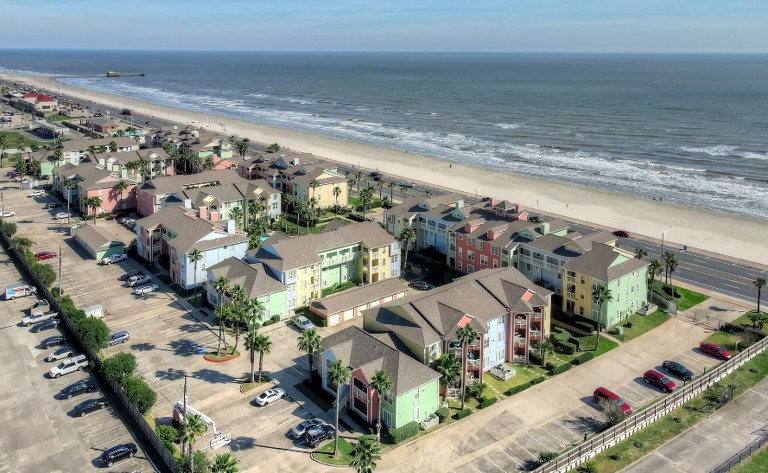 Right on the front row overlooking the seawall and beach!