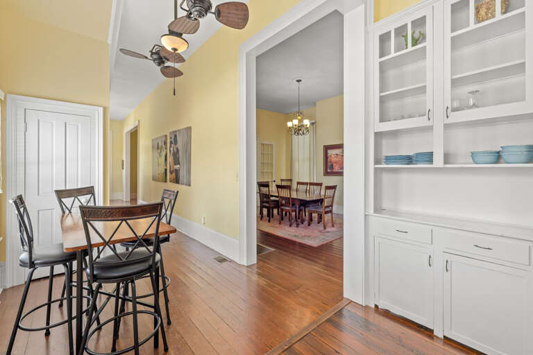 Dining room adjacent to breakfast table and kitchen