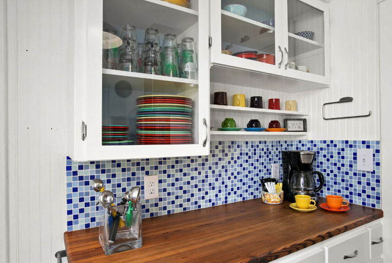 Stocked with plenty of dishes, pots and pans, and bakeware as well as coffee service including Stocked with plenty of dishes, pots and pans, and bakeware as well as coffee service including