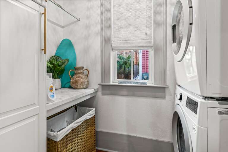 Laundry room with new washer/dryer and folding station. Iron and hangers available.