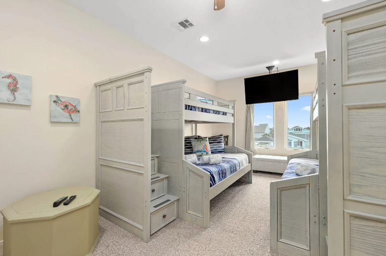 With 2 twin over full bunkbeds sleeping 6 and streaming TV. Located upstairs.