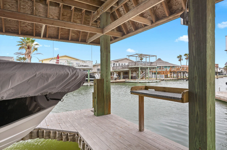 This home is on the canal, and also has a water view off the front overlooking West End Marina!