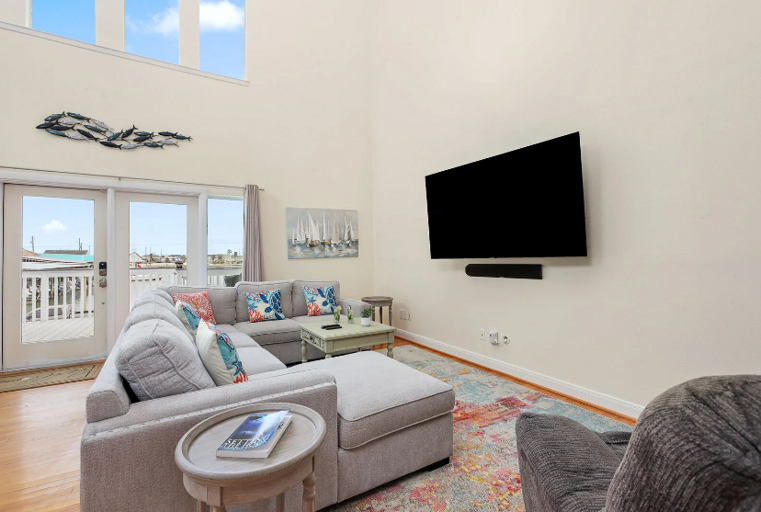 Relax and unwind with family and friends after an adventurous day on the water. Platform sleeper sofa.