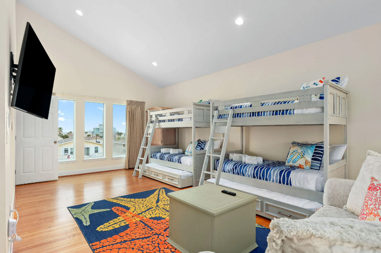 Two twin over twin beds, with  with trundles, sleeping 6.  This is part of the seconfd living area upstairs.