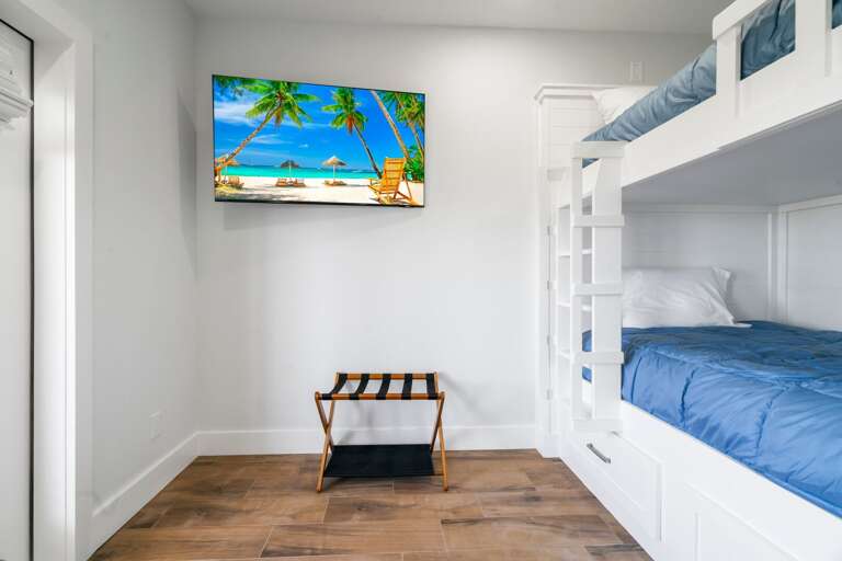 Third bedroom features TV