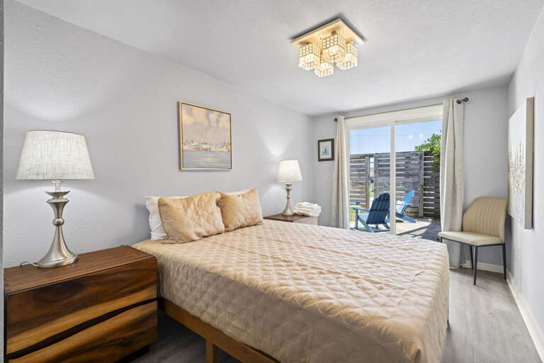 Primary Bedroom with Patio Access Primary Bedroom with Patio Access
