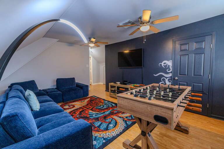 Media Room w/ Foosball Table, Smart TV, and Cozy Couch