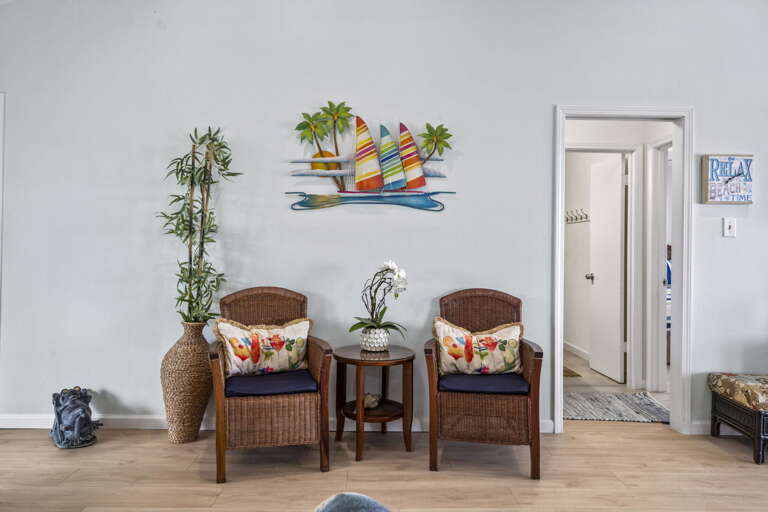 Charming beachy nook with cozy seating — the perfect spot for morning coffee or quiet relaxation.