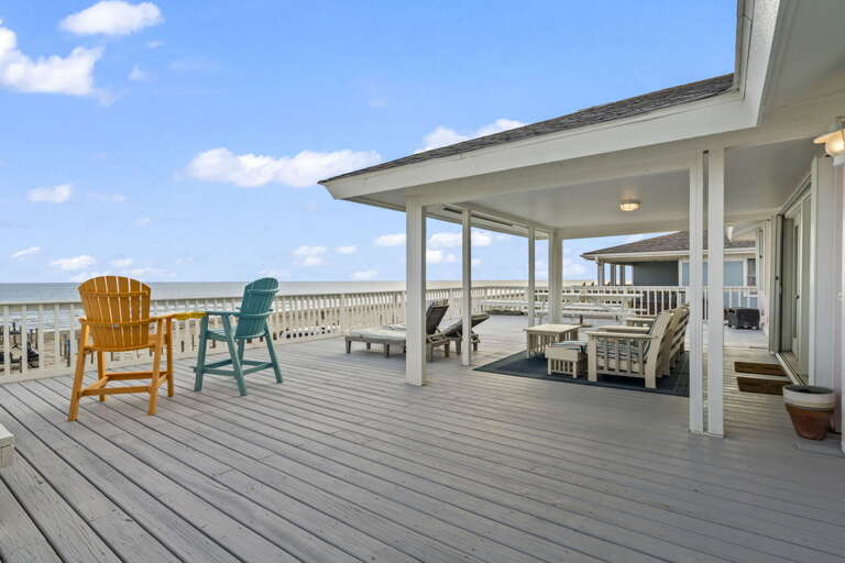 Endless ocean views and plenty of space to lounge — this deck is your beachfront happy place.