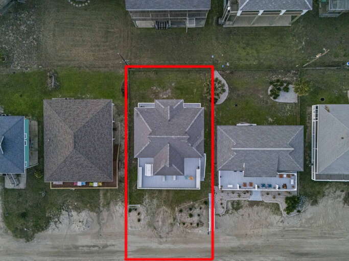 Prime beachfront lot with direct sand access — your private coastal getaway starts here.