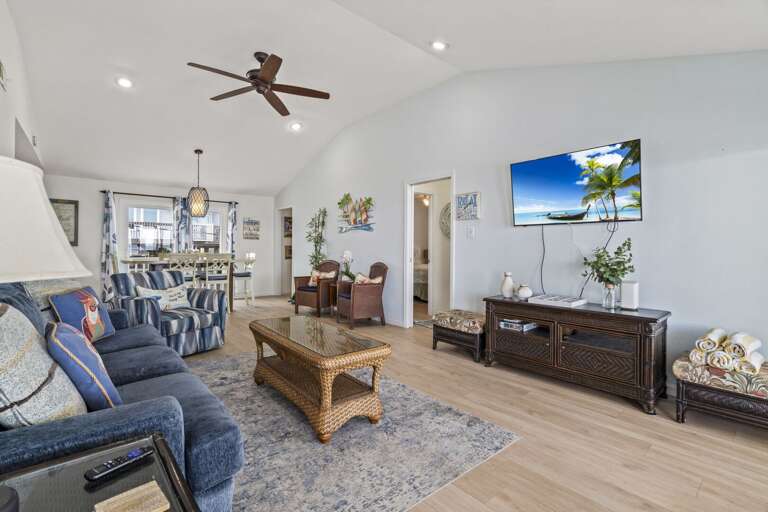 Spacious, airy beach home with cozy seating and plenty of room to relax after a day in the sun.