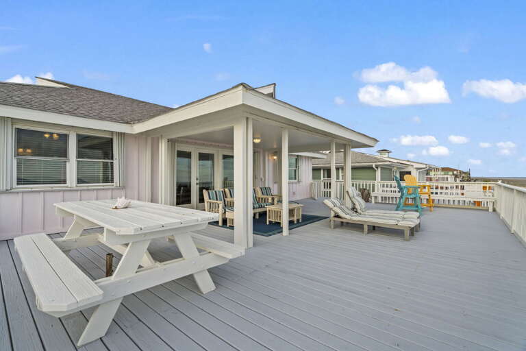 Spacious ocean-view deck made for lounging, dining, and coastal sunsets.