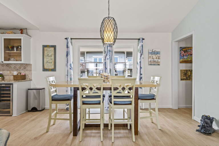 Sunny dining space made for shared meals, laughter, and beachside moments.