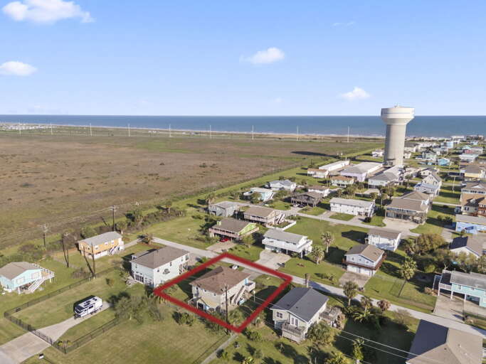 Coastal Community, Distant Water Tower, Outlined Property