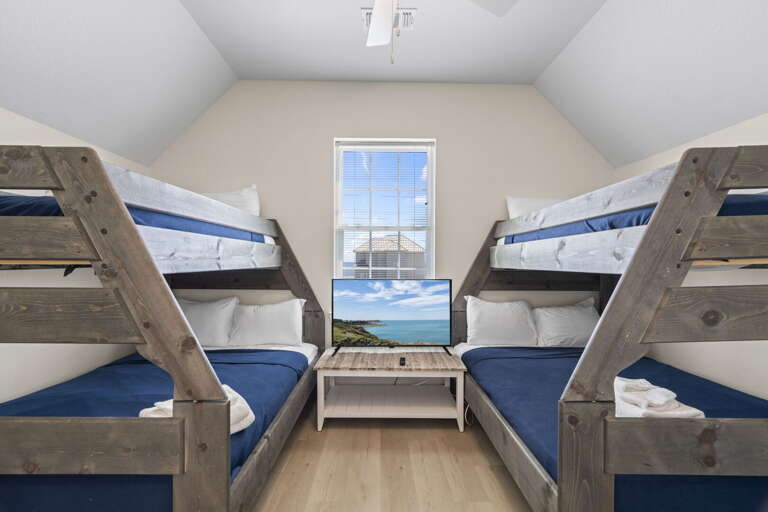 Fun and cozy bunk room—perfect for kids or groups to relax and unwind together.