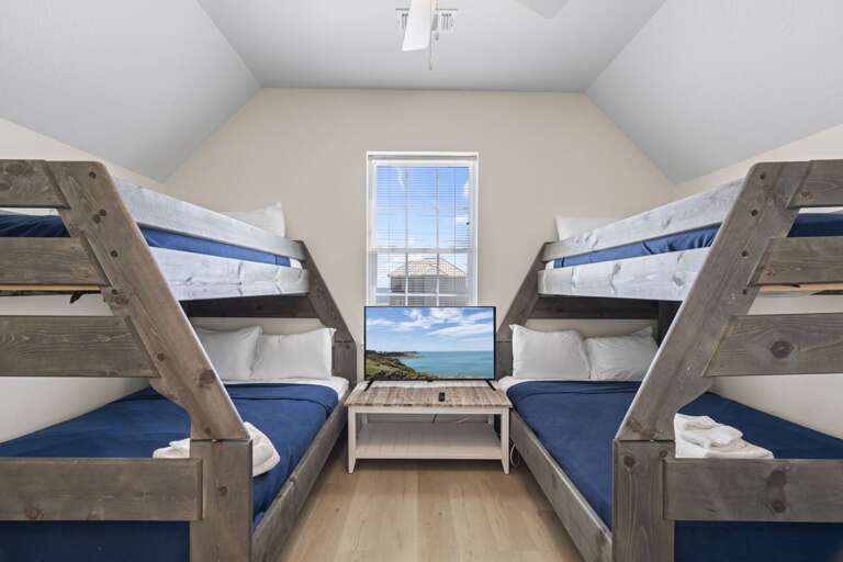 Bunk room with plenty of space for everyone to relax and recharge.