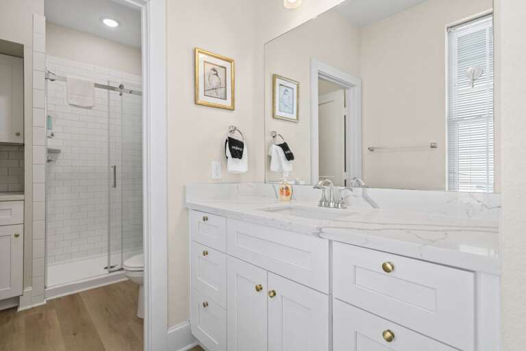 Clean, bright bathroom with a fresh and modern feel.