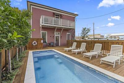 Charming retreat with a private pool and sun-soaked deck, perfect for relaxing in style.