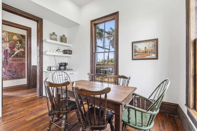 Cozy breakfast nook with charming vintage touches and natural light—perfect for slow mornings and coffee.