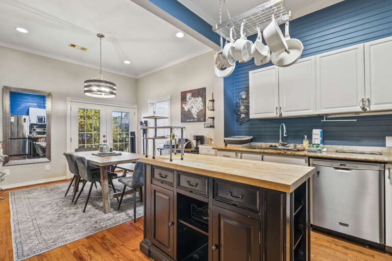 Gather, cook, and dine together in this spacious coastal kitchen.