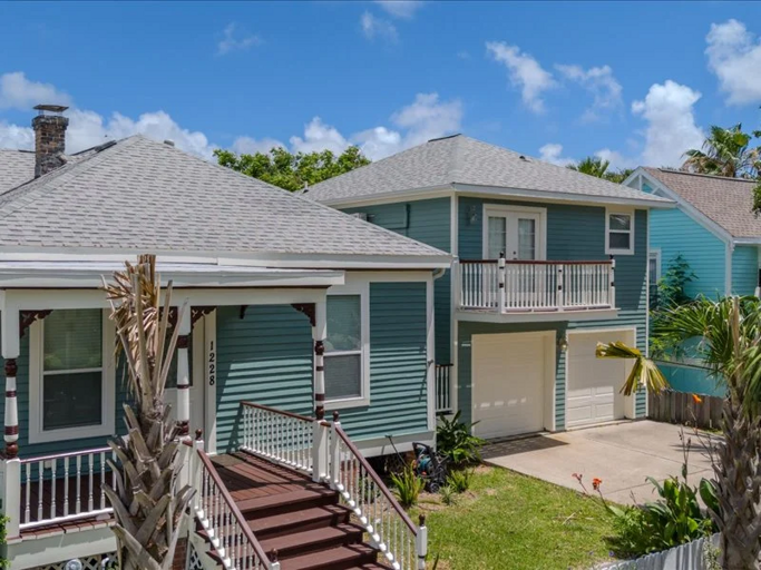 A charming coastal-style home with inviting outdoor spaces.