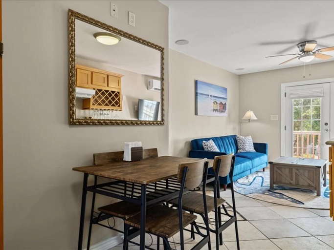 Enjoy an open living and dining space with comfortable seating and plenty of room to relax together.