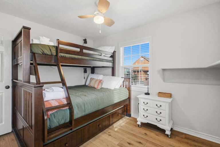 A comfortable bunk setup provides flexible sleeping arrangements for families and groups.